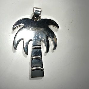 Sterling Silver Palm Tree necklace pendent. It is 1 3/4 inches tall.